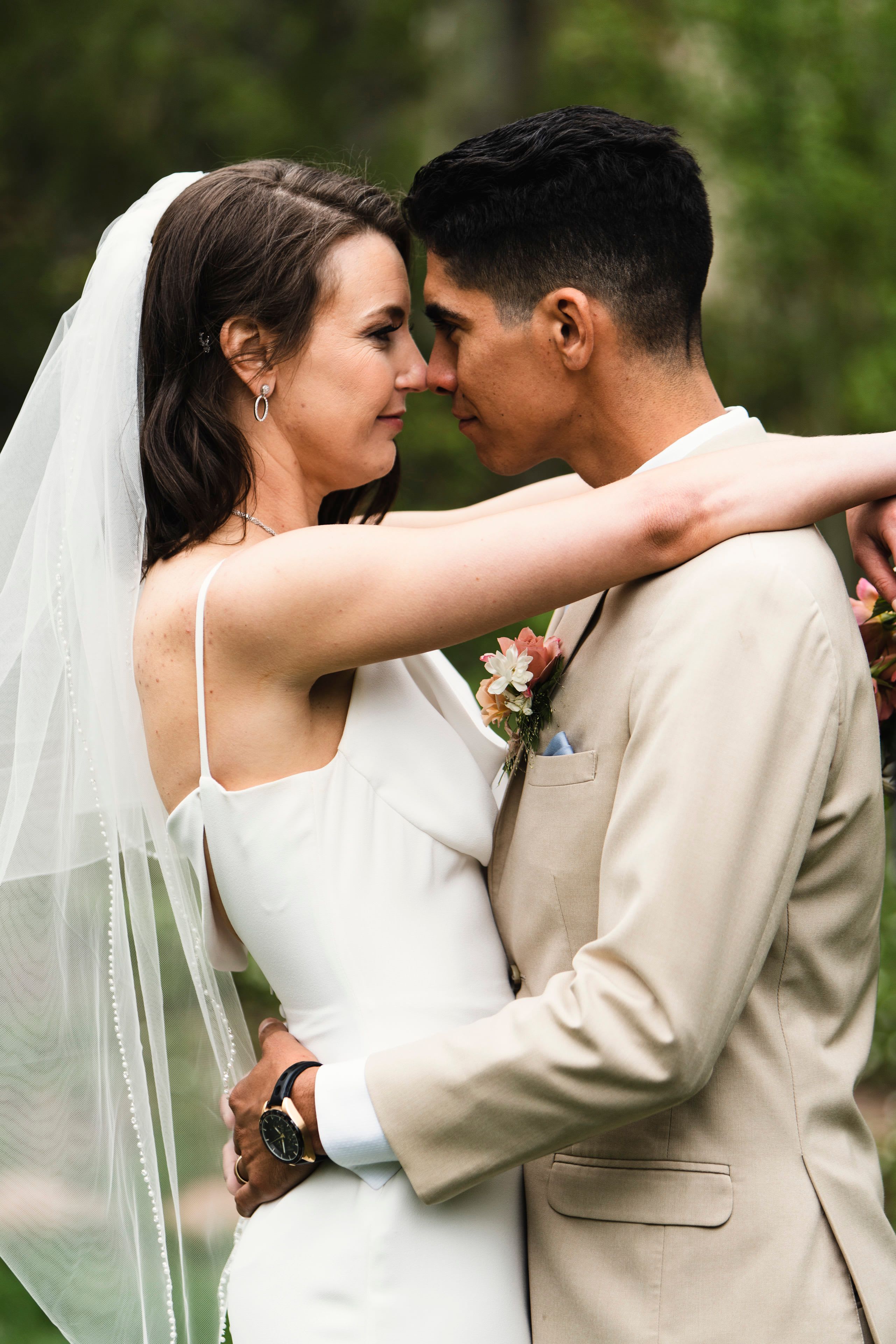wedding couple in close embrace