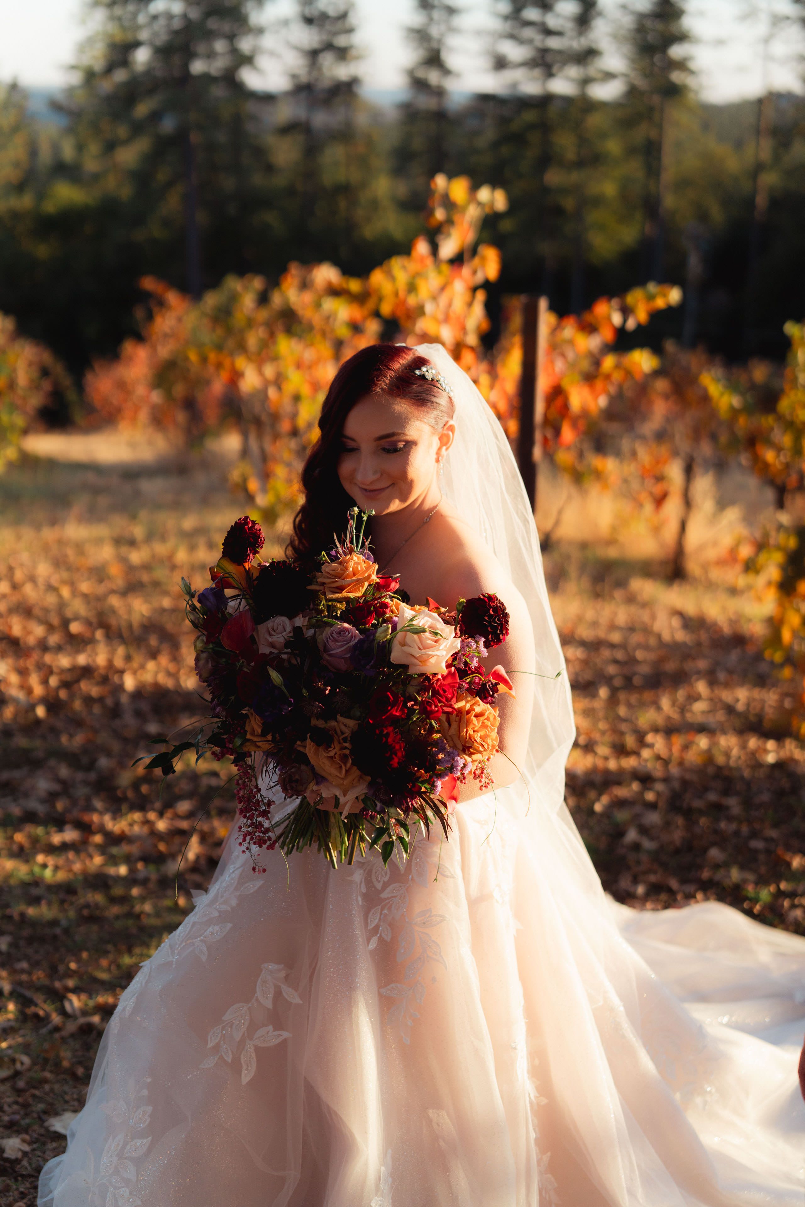 bride in wedding dress with flowers