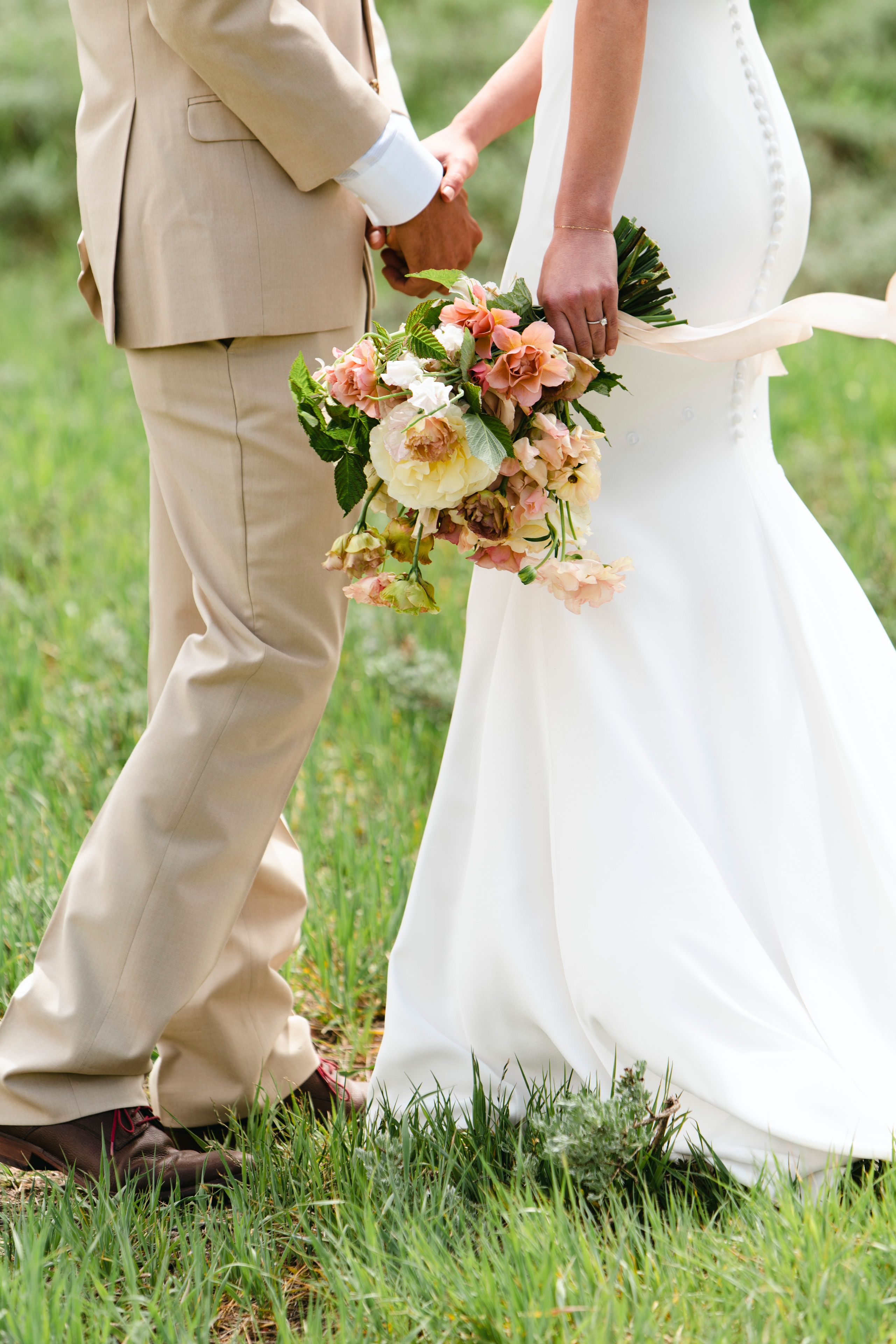 tight shot of a wedding couple holding hands | Amanda & Henry