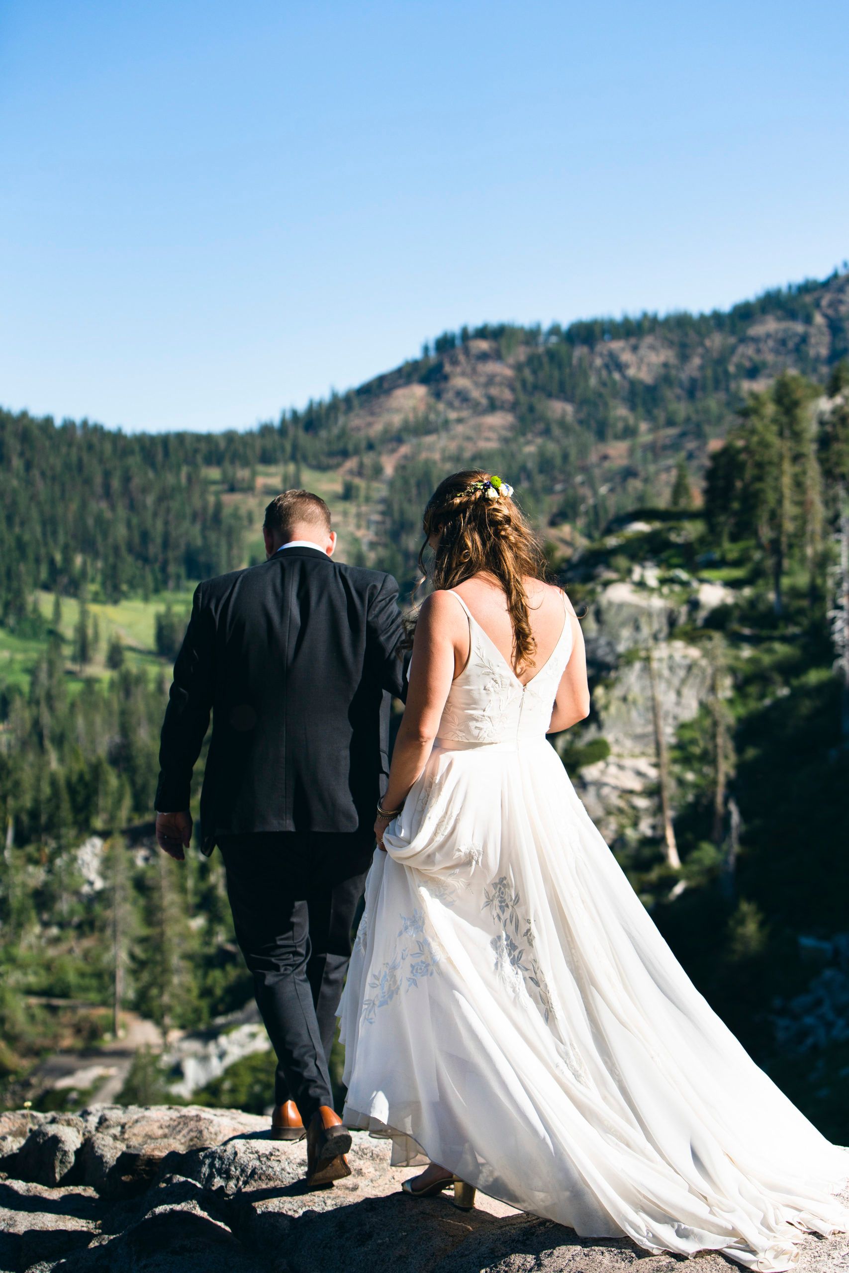 a wedding couple on first look with backs turned | null & null