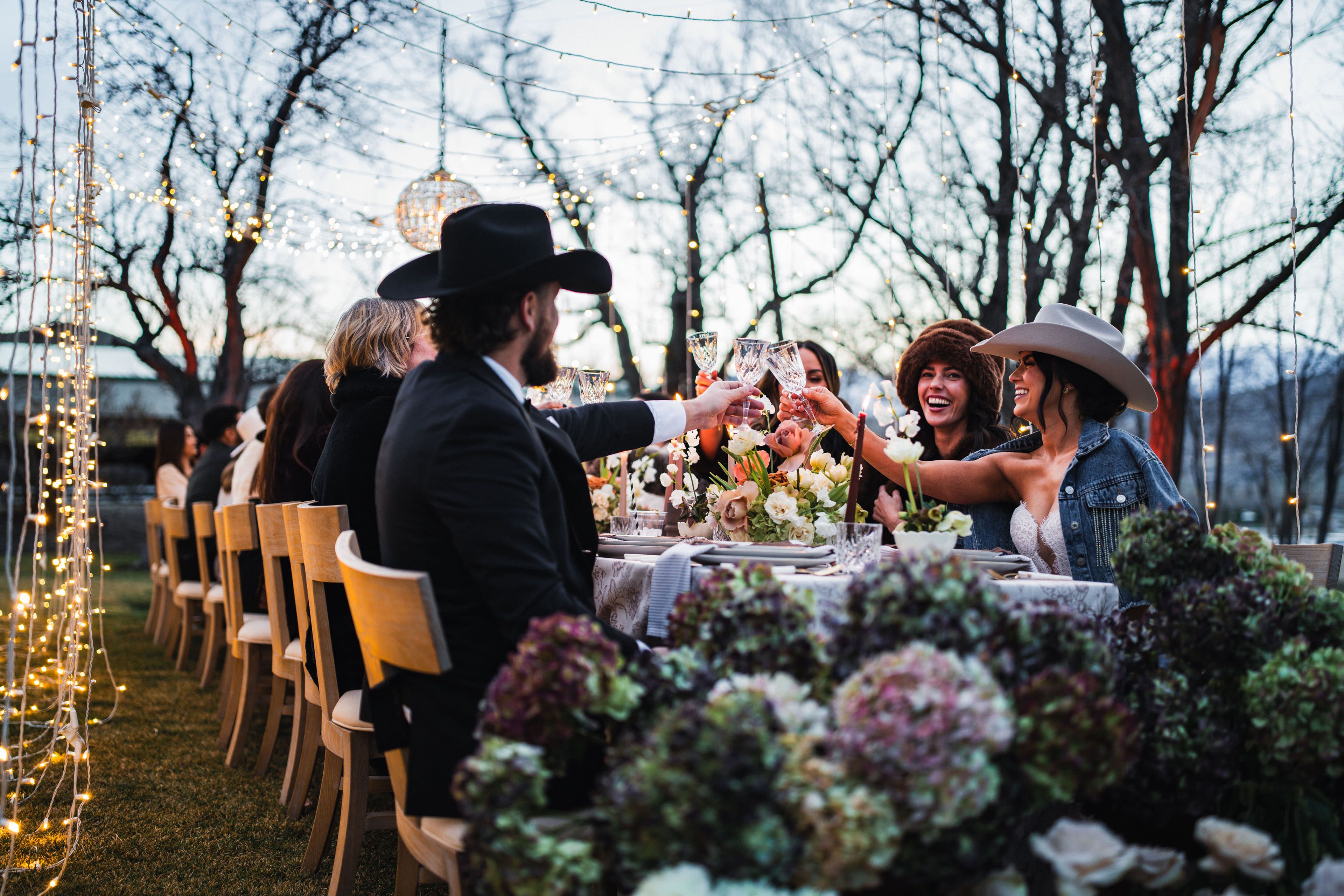 wedding couple at reception table | null & null