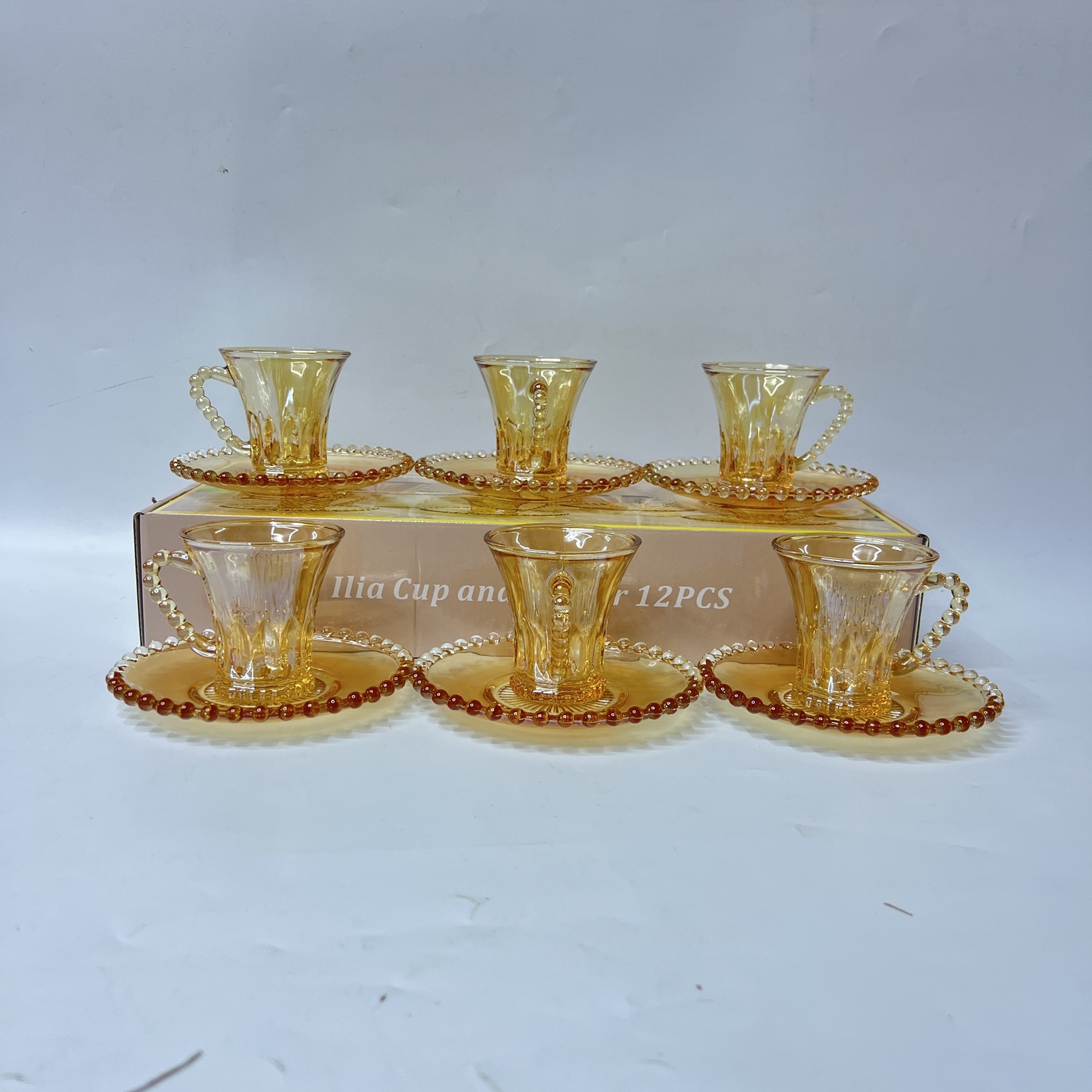 Image of Ilia 12-Piece Cup and Saucer Set (Q6918-6H) – Elegant Amber Glassware