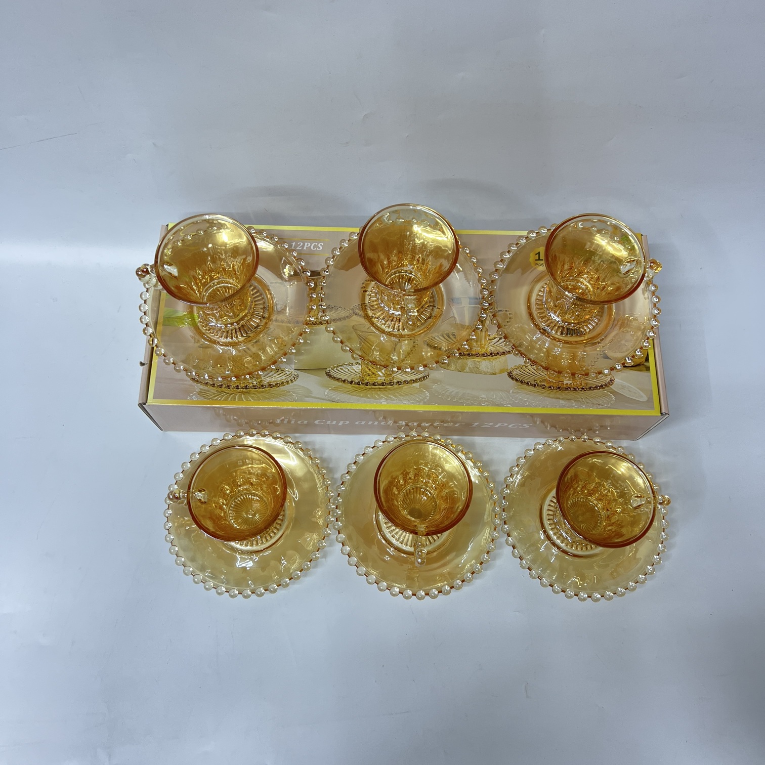 Image of Ilia 12-Piece Cup and Saucer Set (Q6918-6H) – Elegant Amber Glassware