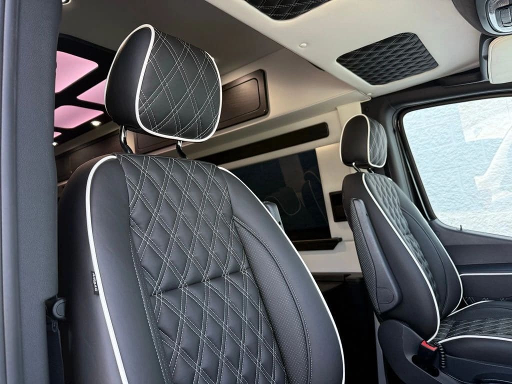 Discovery Touring interior — luxury Sprinter van cabin