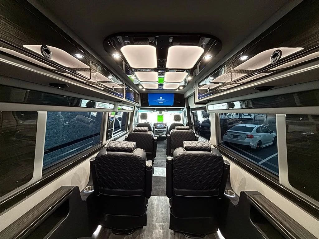 Sprinter passenger cabin with individual chairs and overhead lighting