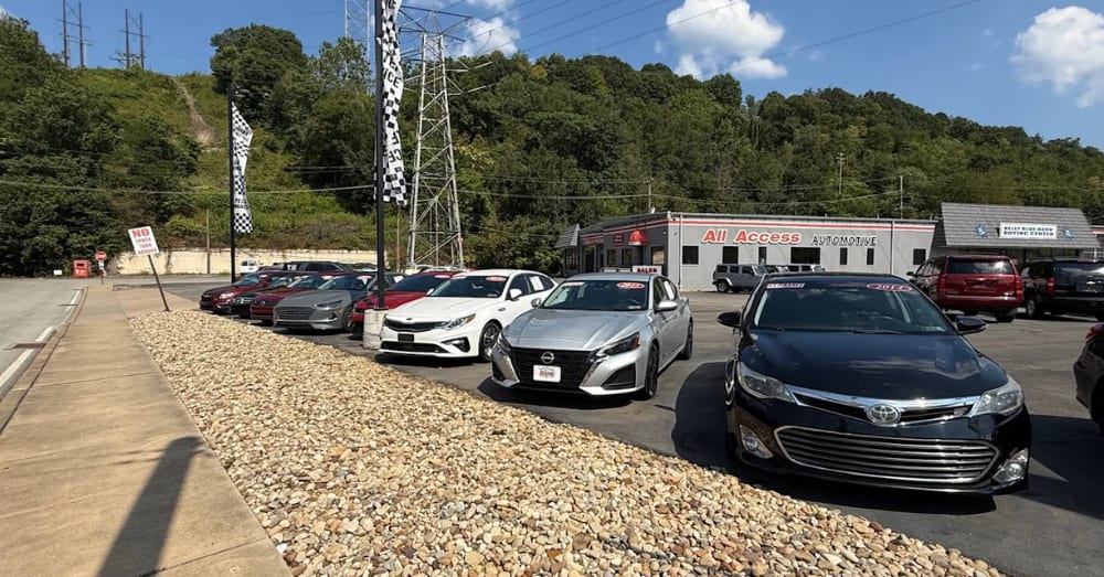 Pre-owned cars, trucks, and SUVs on the lot at All Access Automotive in New Brighton, PA