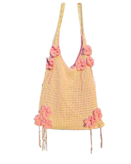 Sac au crochet en fil jaune, orné de fleurs roses crochetées et de franges