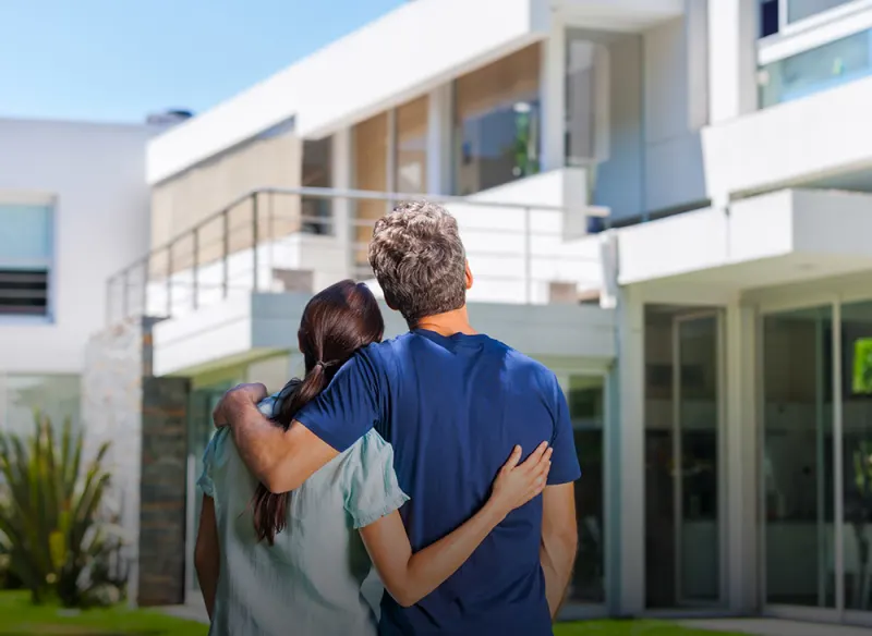 Photo of couple searching for builders