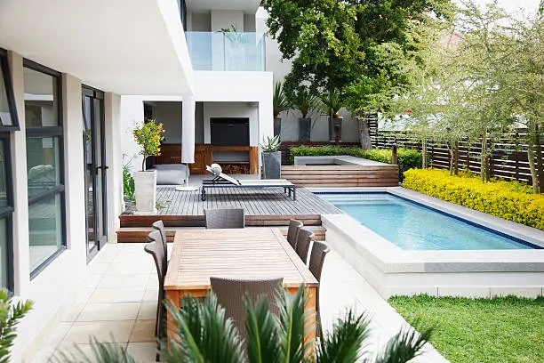 Photo of pool with outdoor entertainment area