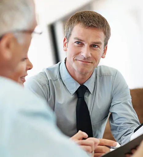 Photo of broker with clients