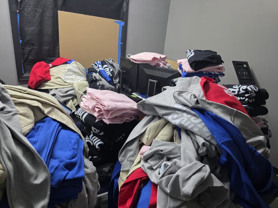 Bulk custom T-shirt order prepared for production