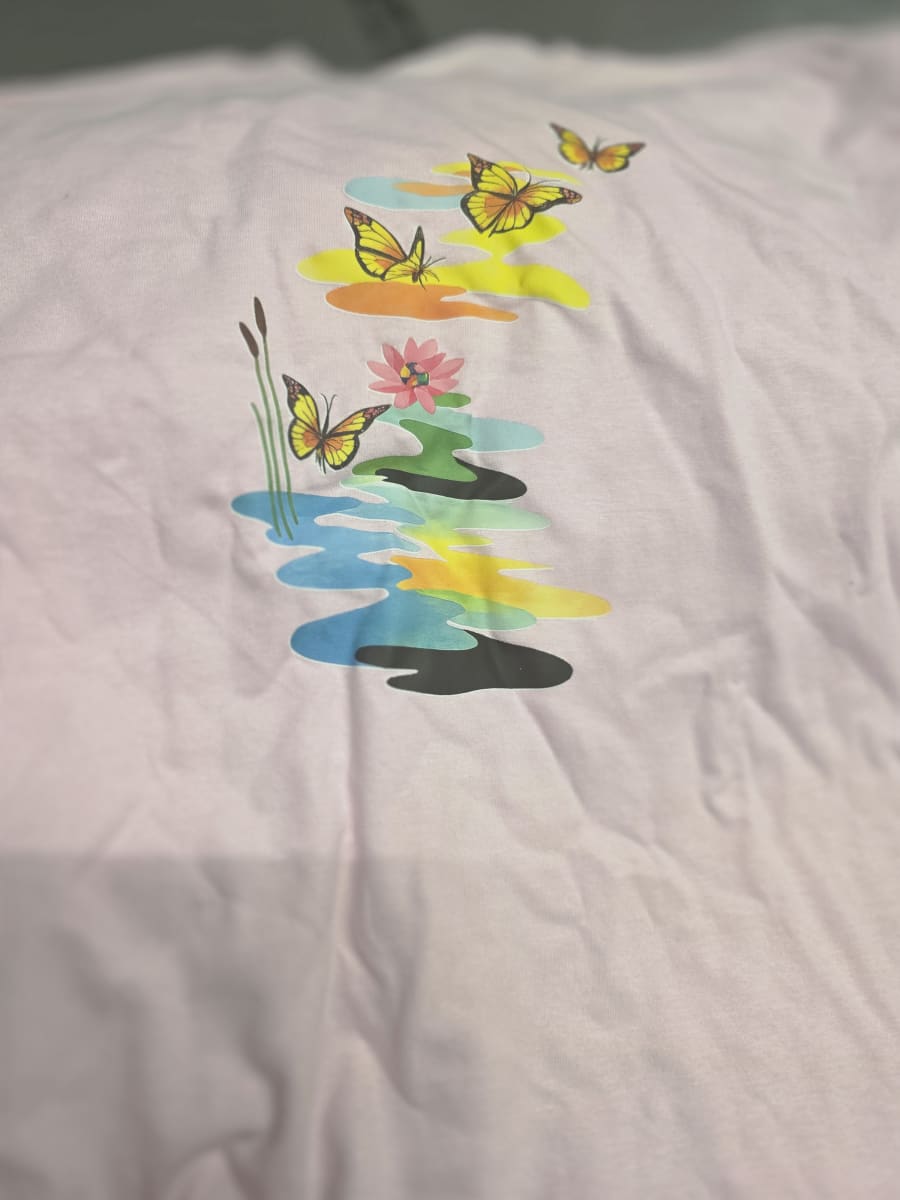 Pastel custom T-shirt with colorful butterfly print
