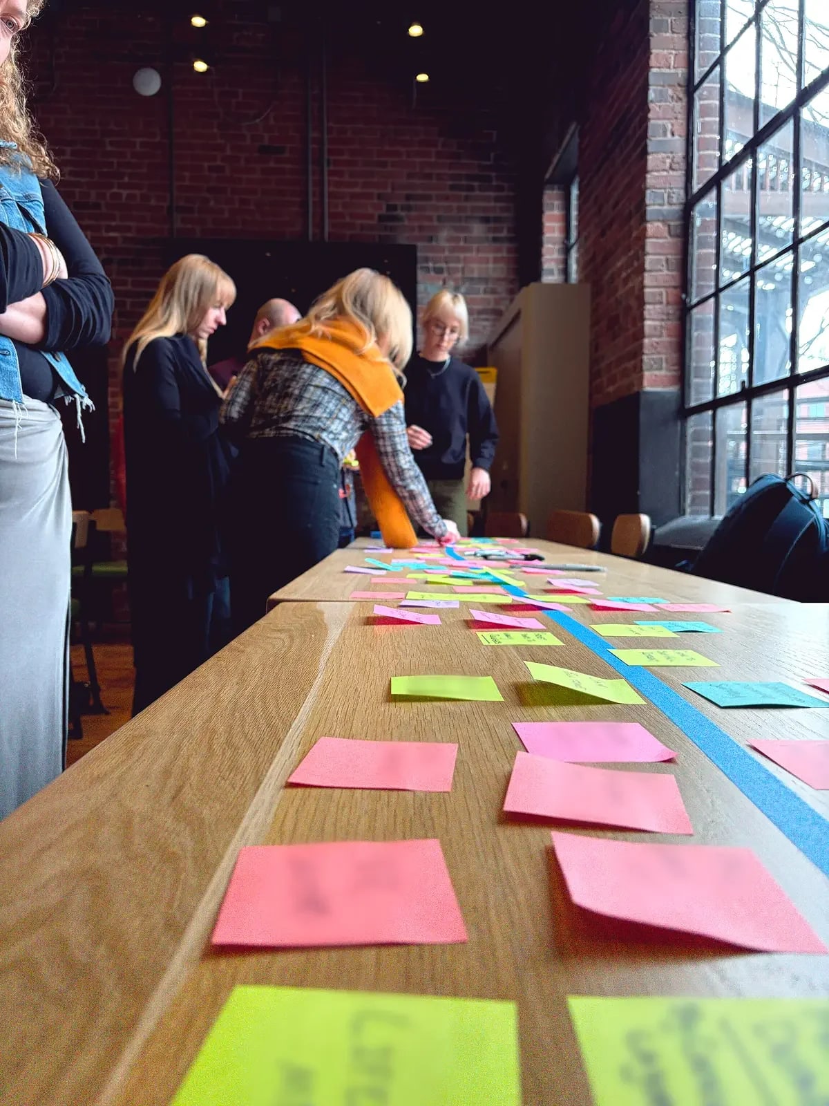 Project strategy workshop with research notes and sticky notes at Matrix Web Digital
