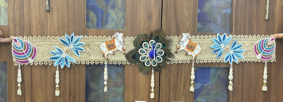 Peacock Feather Toran for Main Door – Blue Lotus, Decorative Cow Motifs & Pearl Hangings | Durva Creation