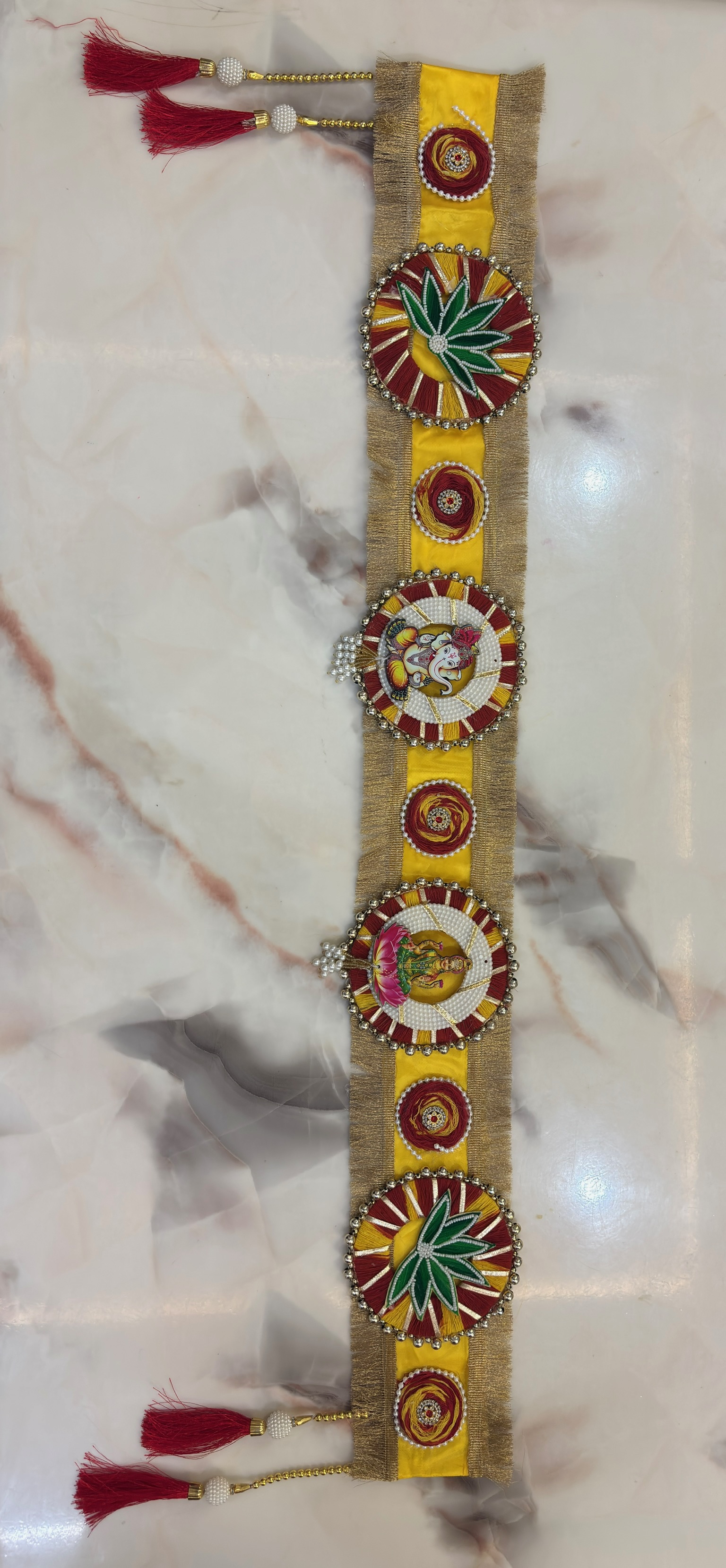Yellow Pooja Toran for Main Door – Ganesh Ji & Lakshmi Ji Wall Hanging with Maroon Tassels | Durva Creation