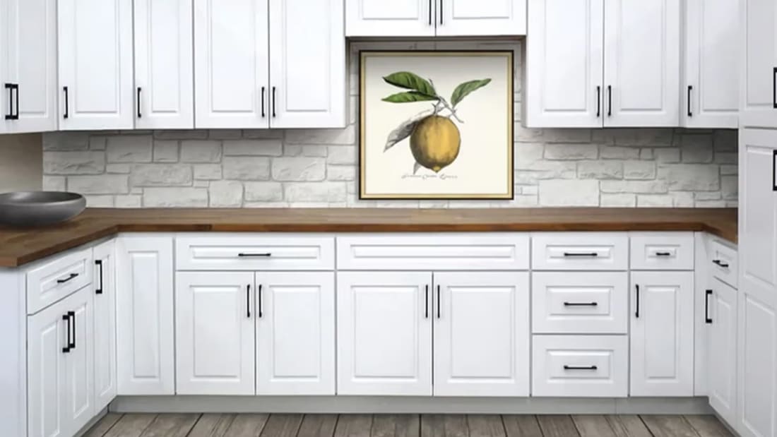 Kitchen featuring Ice White Raised Panel CraftMark cabinets