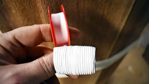 Wrapping in Teflon tape Wrapping in Teflon tape