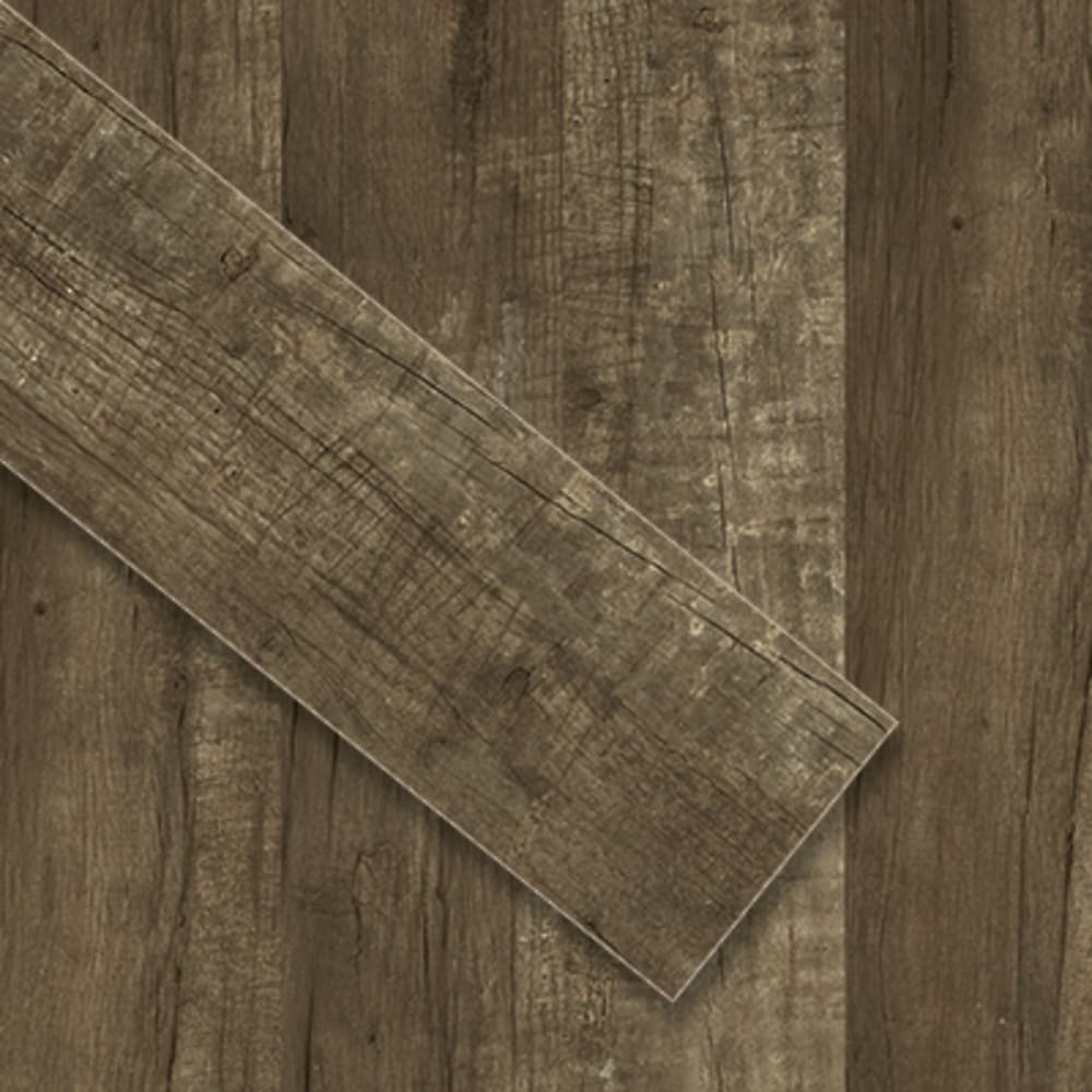 Rustic wood plank in a durable ceramic format. Brown blend woodgrain plank with a slight faded appearance. 5538773 Tavola Cafe 6x24 Ceramic Plank