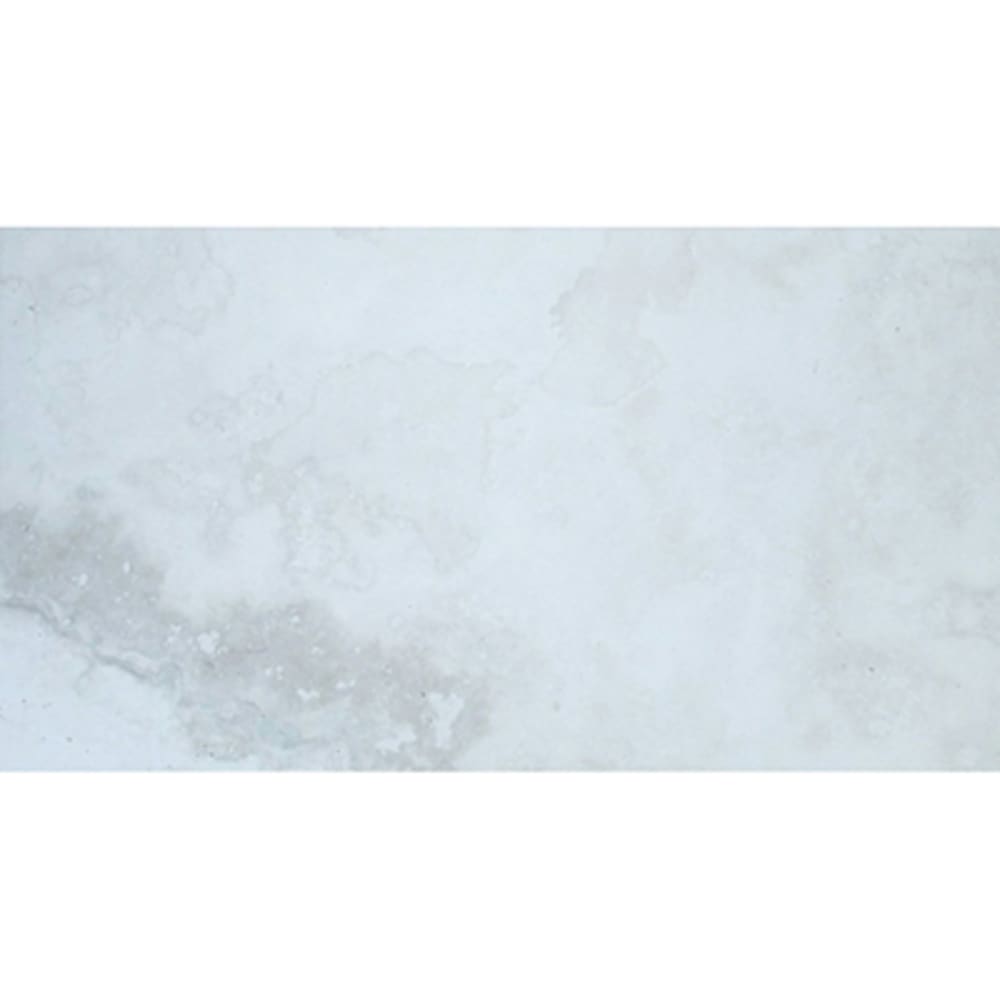 White/Ivory based Travertine look porcelain tile with sweeping shades of Grey. This porcelain tile is great for any room in the home and 5534564 Arrakis White 12x24 Porcelain Tile