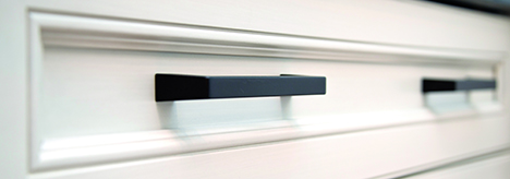 black cabinet pulls on white cabinets