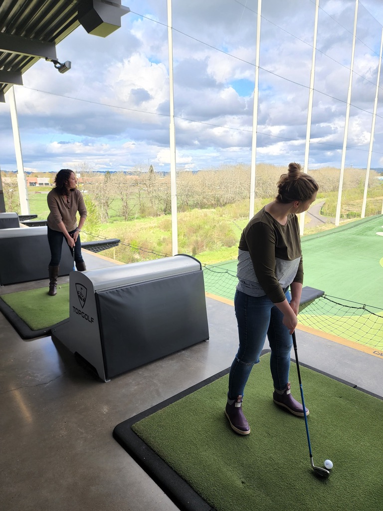 Women playing golf