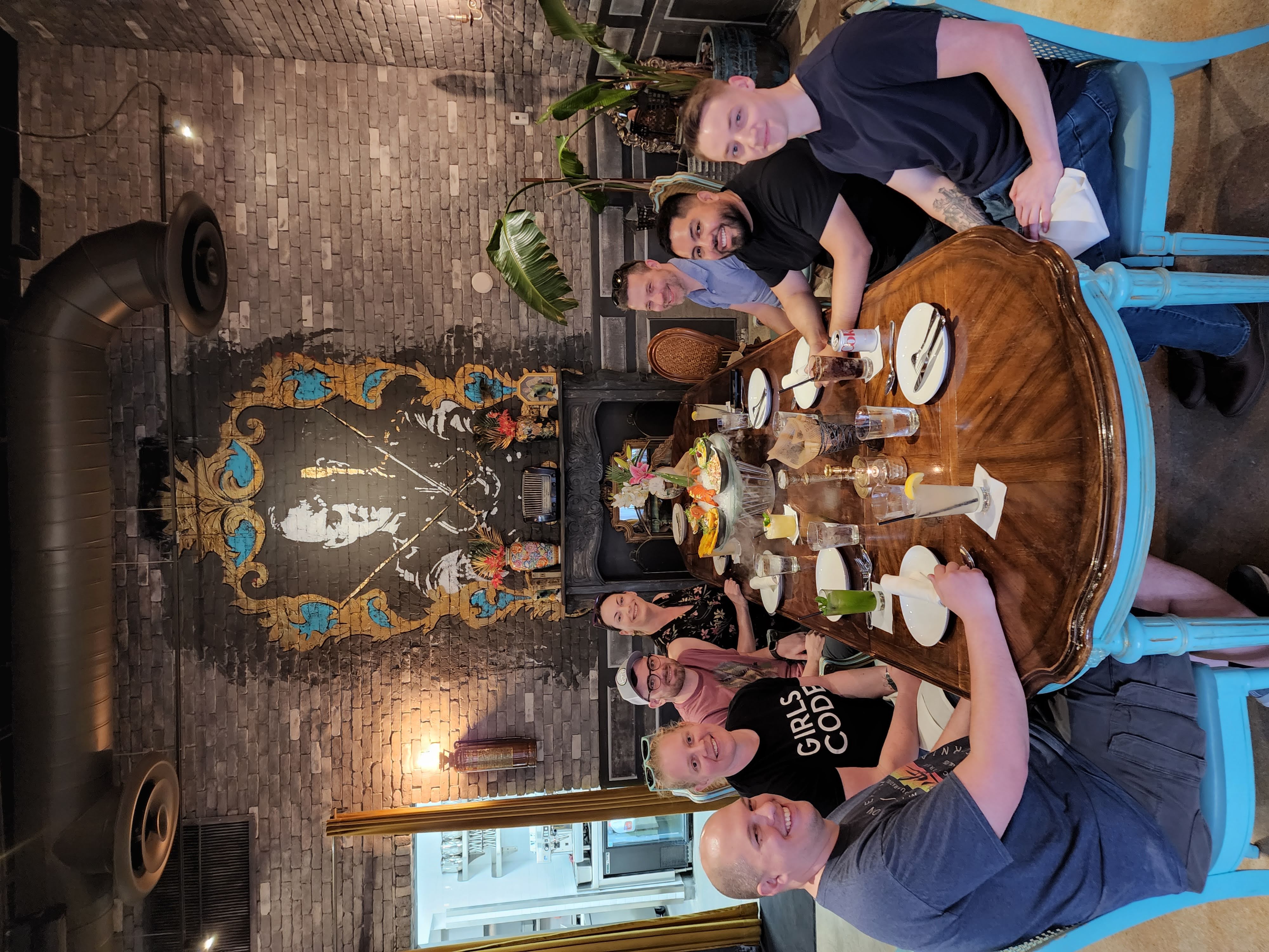 photo of the echobind team at dinner after React Miami