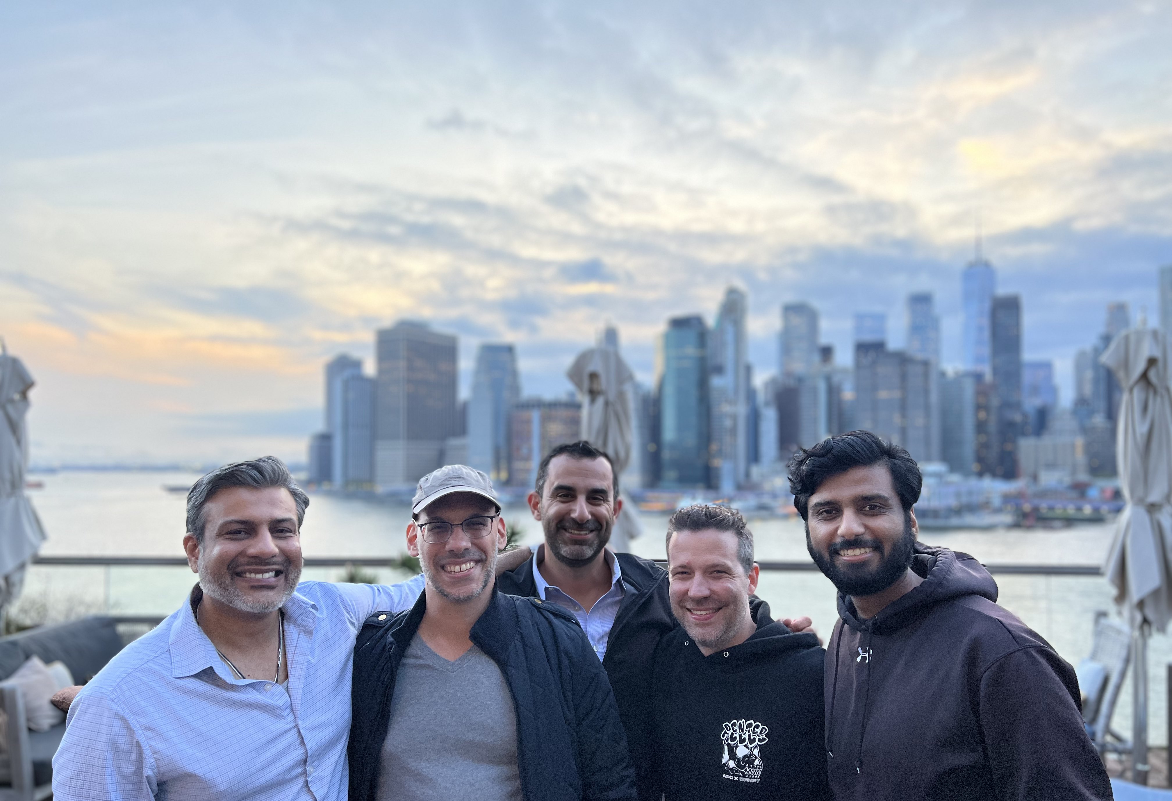 Men standing on New York roof top