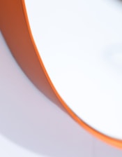 Round 60cm Burnt Orange Framed Wall Mirror