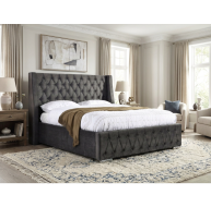 grey fabric bed with button headboard and footboard design