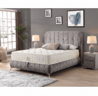 luxury high mattress on grey fabric storage bed