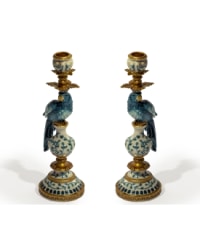 A Pair of Antiqued Ornate Blue/White Parrot Candle Holder
