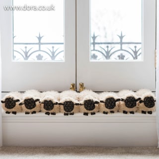 Row of Sheep Draught Excluder by Dora Designs