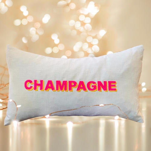 Champagne embroidered cushion