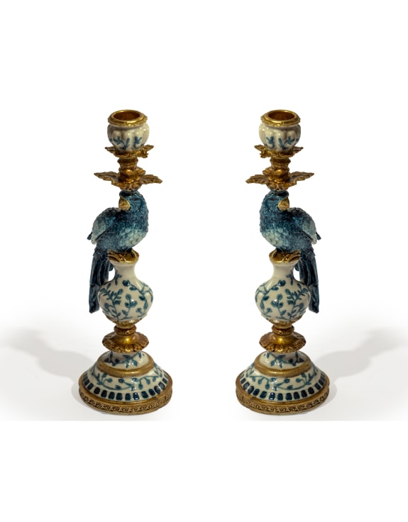 A Pair of Antiqued Ornate Blue/White Parrot Candle Holder
