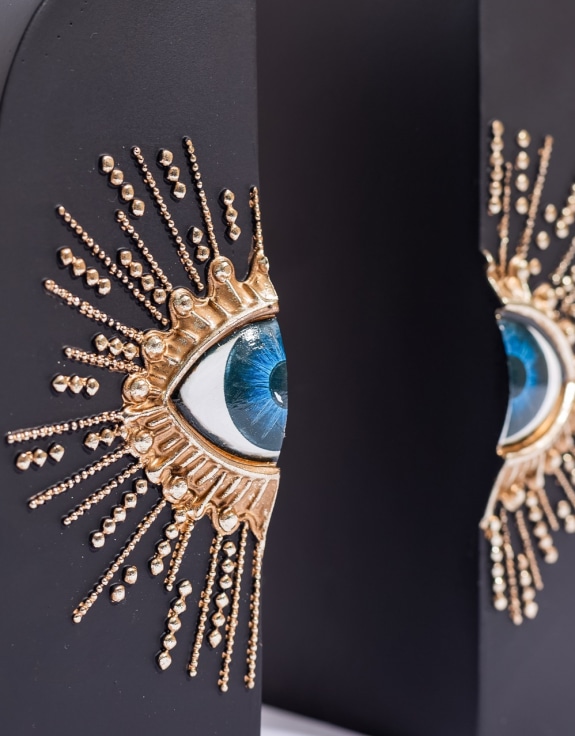 Pair of Embossed "Sunburst Eye" Bookends