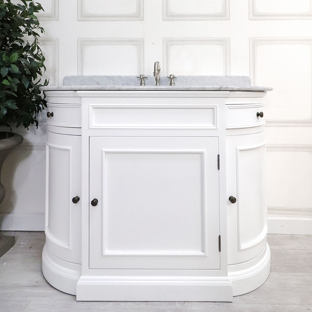 White Sink Unit with Mirror and Taps