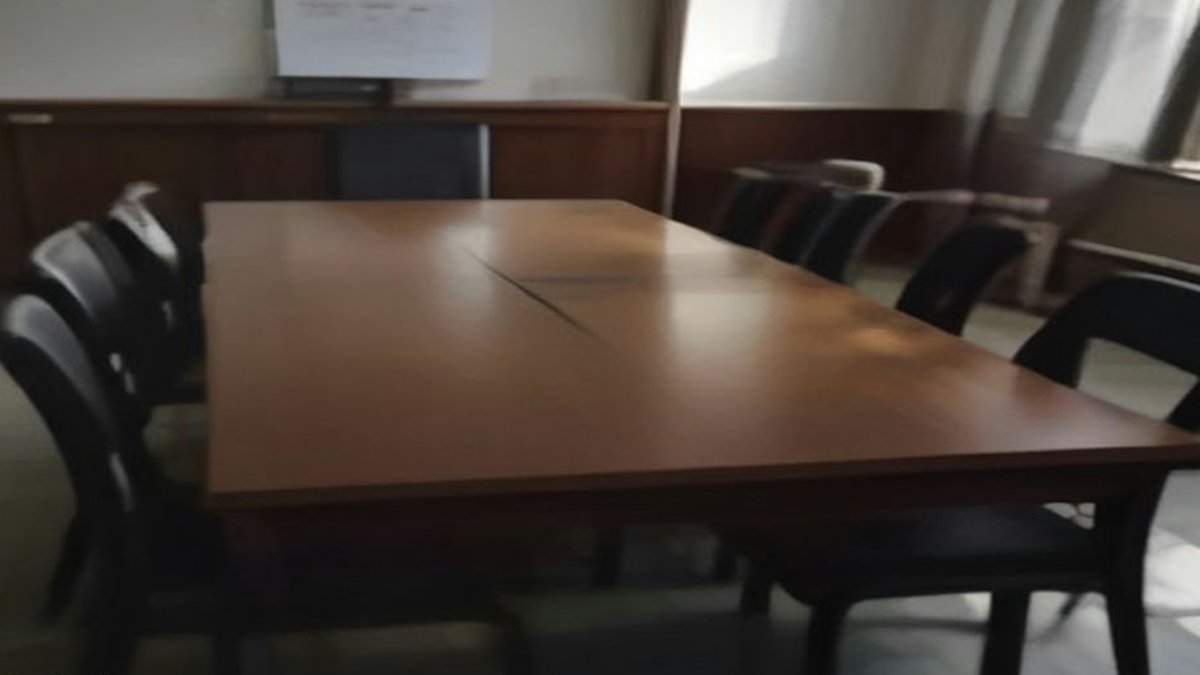 University administration office meeting.