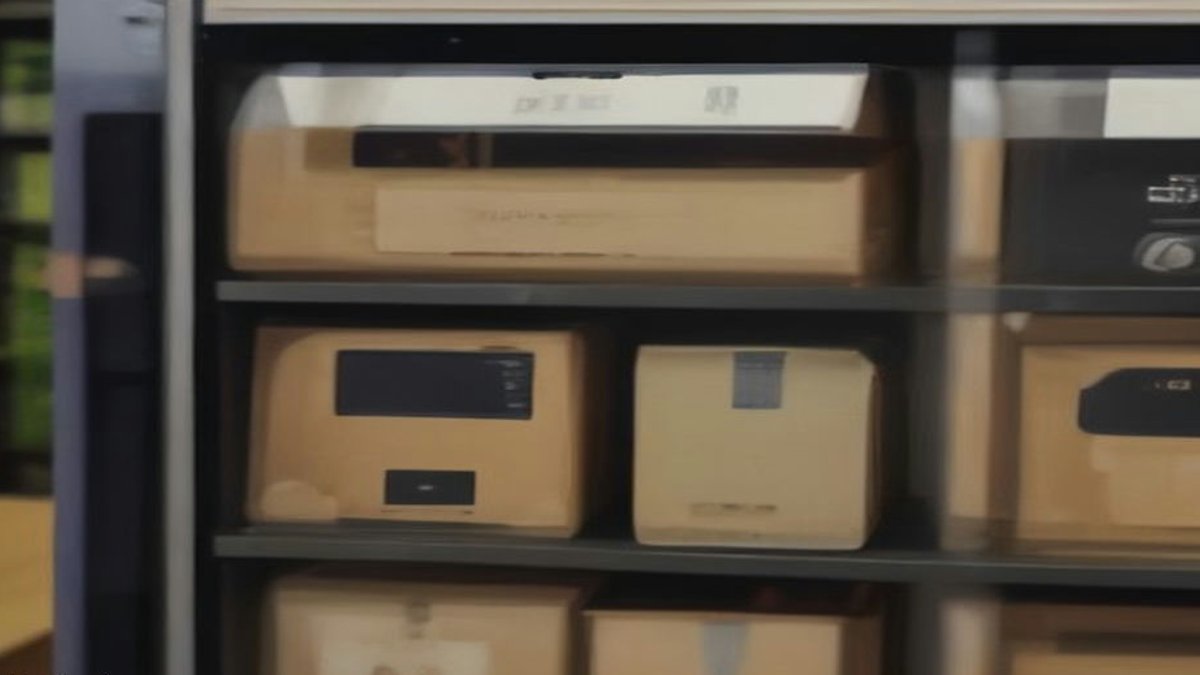 Ledger hardware wallet packaging on shelves.