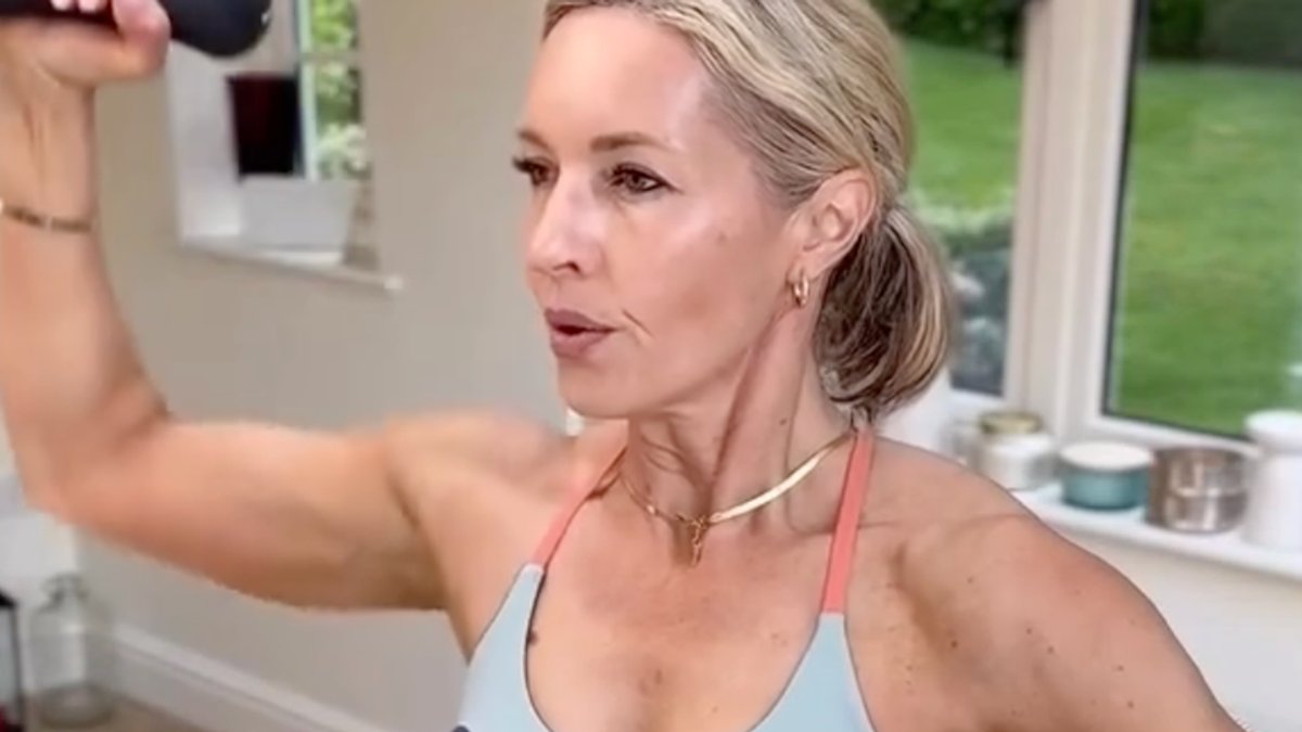 Trainer shows light weights build strong shoulders Trainer shows light weights build strong shoulders - light weights
