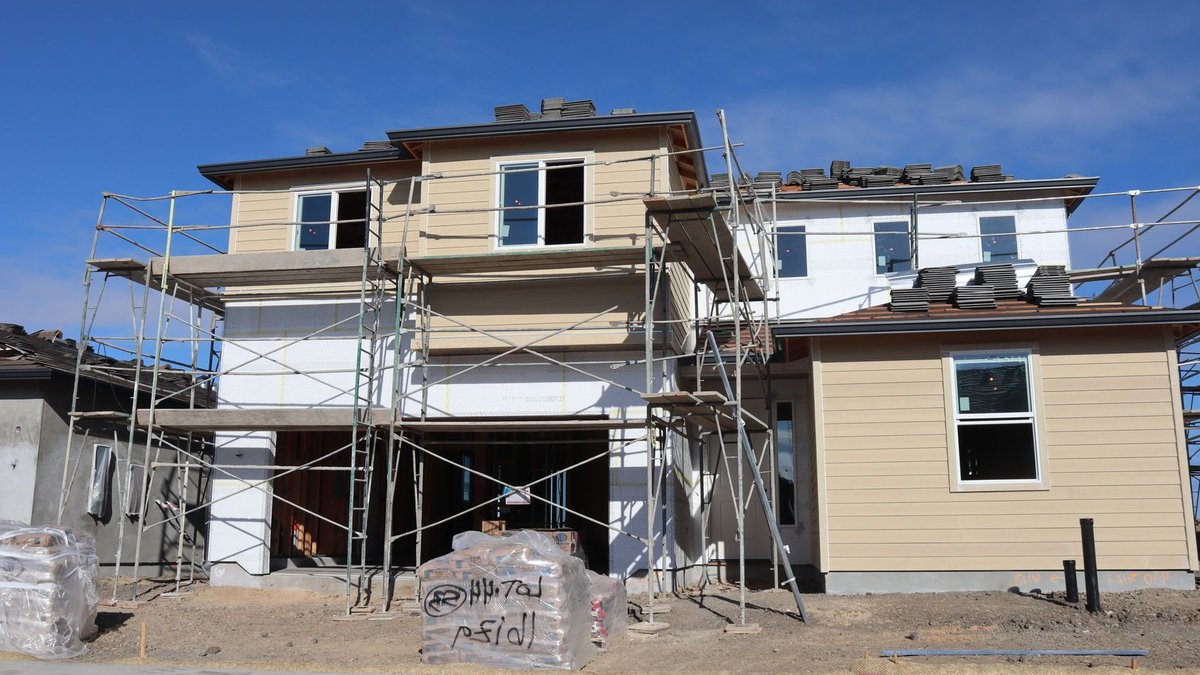 Bhubaneswar Real Estate Sees Strong Growth as Tier-2 Markets Rise Under-construction house with scaffolding indicating active building progress under clear skies.