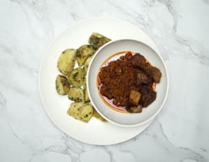 healthy eating with her sweet potatoes and fish stew