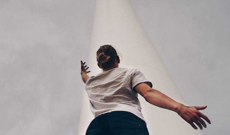 Woman Reaching for Faraway Goal