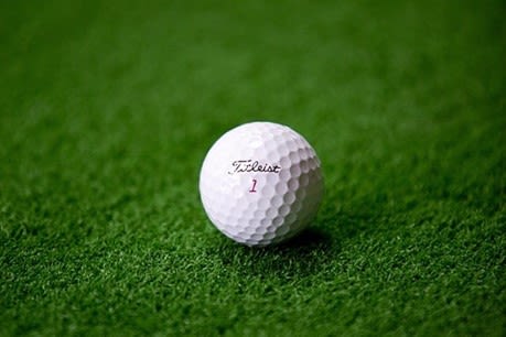 Image of a golf-ball on the green