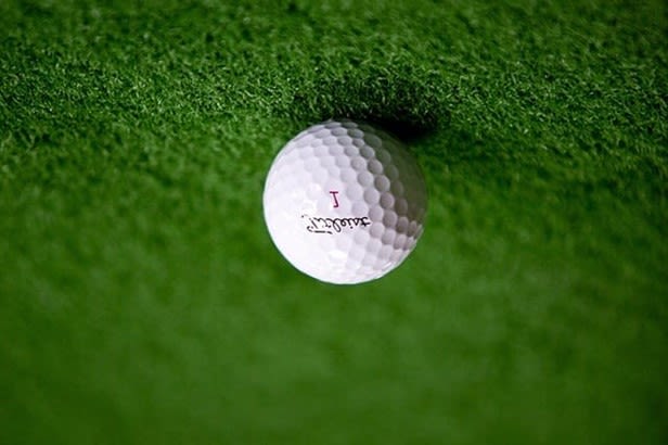 Example of using the verticalflip transformation on the image of a golf ball