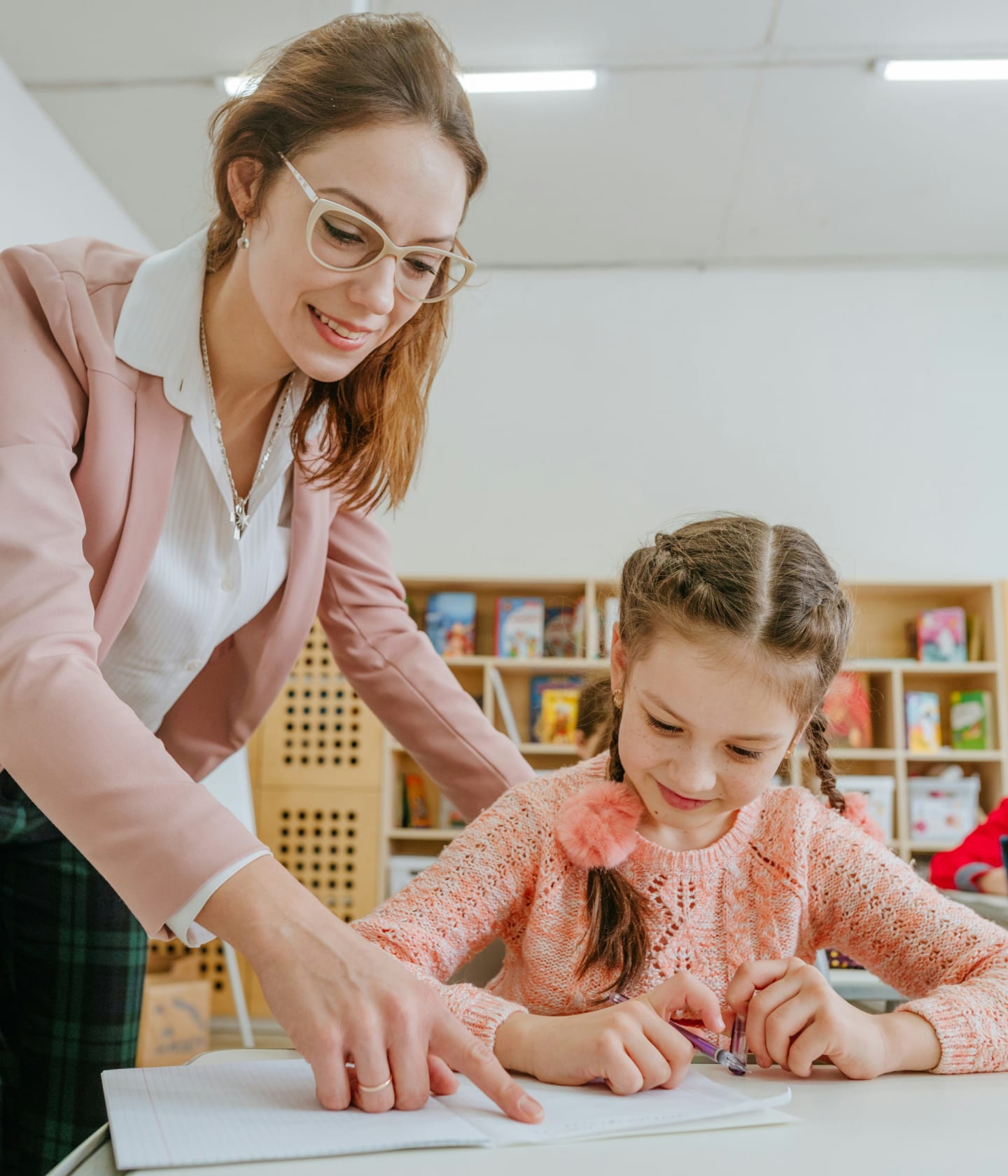 Teacher interacting with a child