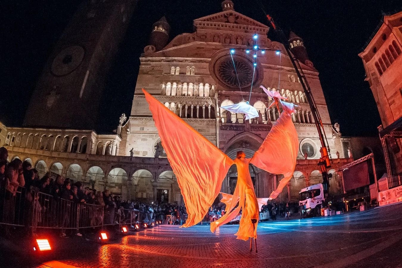 Aerial performers in front of Cremona Cathedral during Festa del Torrone