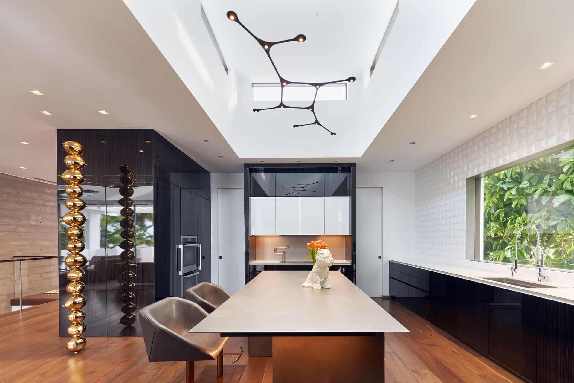 Dark Concrete island and glass front bar