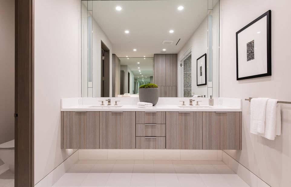 exquisite natural wood finish on a luxury vanity designed by eggersmann in a multi-million dollar beachfront home in newport news, california
