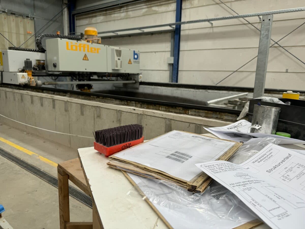 textural brushing and finishing machine in our stone factory in germany