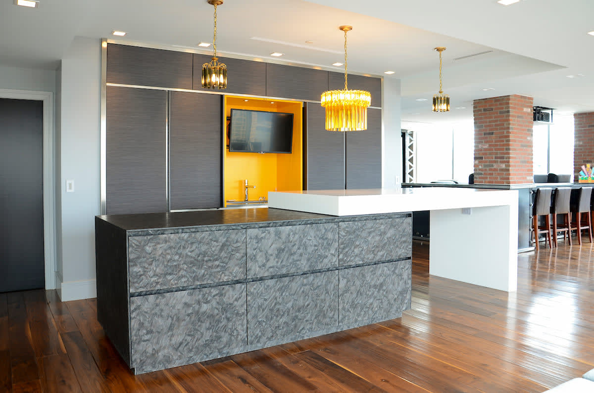 eggersmann-designed kitchen featuring island clad with phyllite brazilian quartz from eggersmann unique cabinetry collection